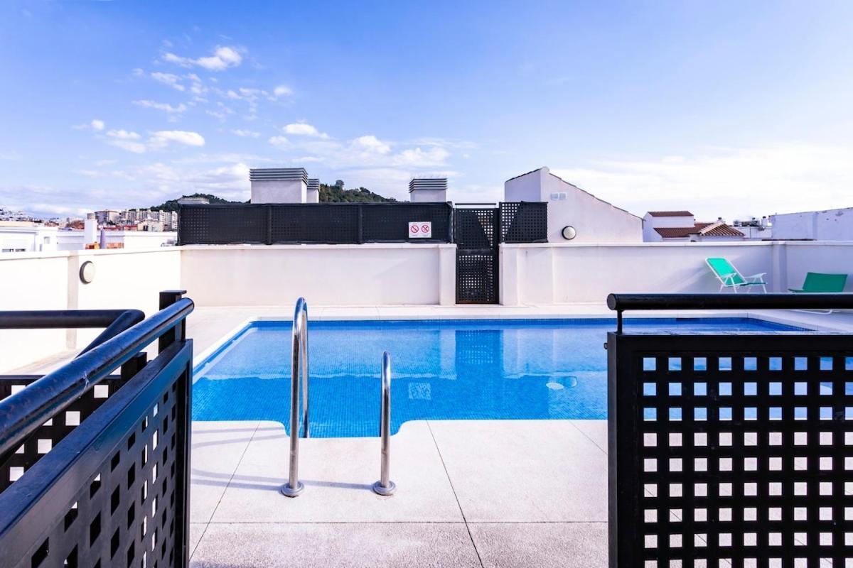 -Malagasunapts- Central Freeparking Rooftoppool Extérieur photo